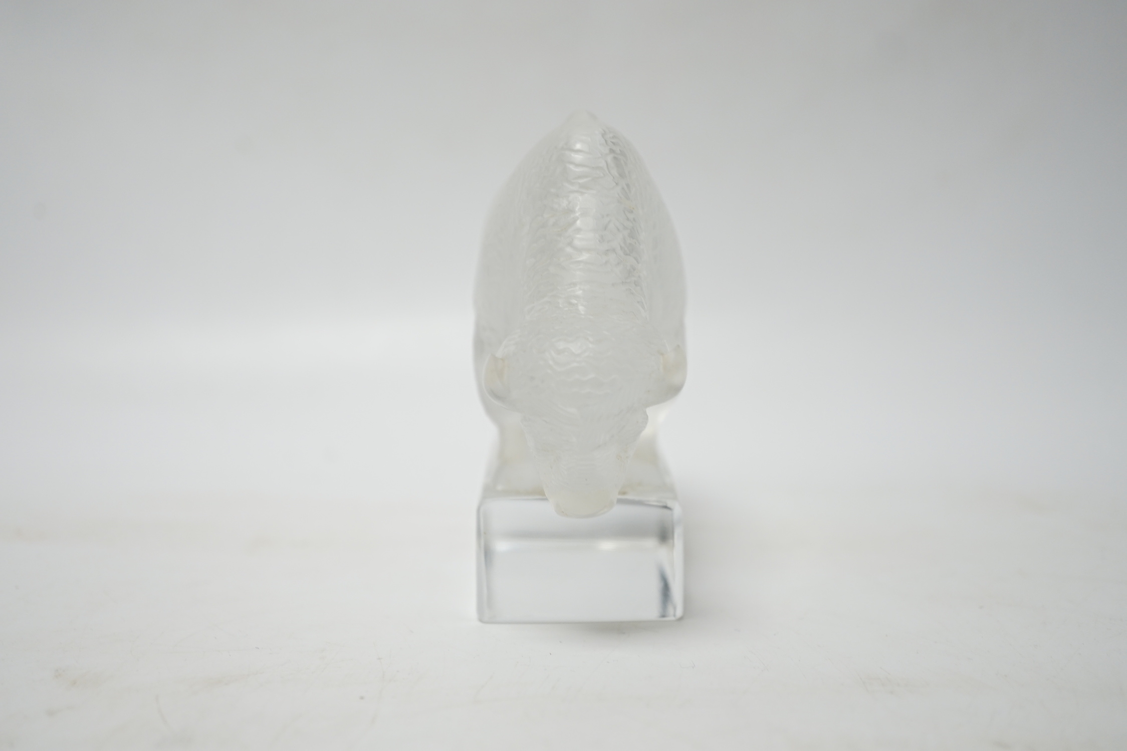 Rene Lalique, a frosted glass paperweight modelled as a bison, signed ‘Lalique France’ to base 12.5cm wide